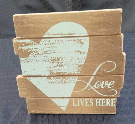 Love Lives Here sign