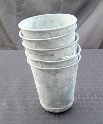 Small metal buckets